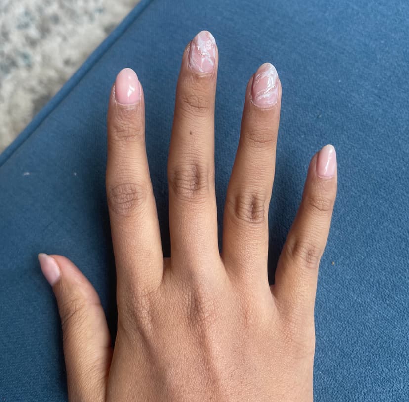 Image of pink gel manicure with marble effect